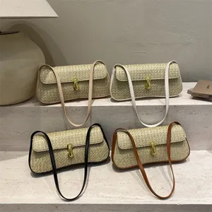 Woven straw shoulder bag with metal lock, chic PU leather strap, stylish underarm handbag.