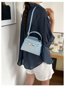Chic light blue women handbag stylish shoulder bag elegant top handle bag for spring summer.