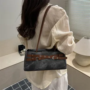 Minimalist denim underarm shoulder bag for women, stylish contrast belt handbag chic daily use.