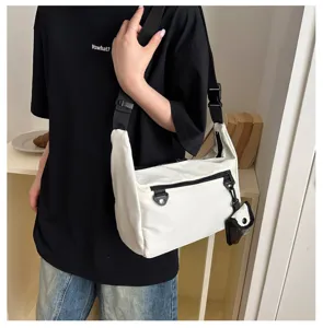 Stylish casual white crossbody bag with large capacity, trendy design for daily student use.