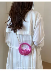 Stylish pink metallic crescent mini chain crossbody bag for women fashion accessories daily wear.