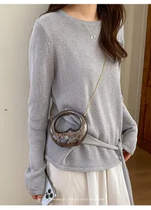 Fashion metal crescent mini crossbody bag with delicate chain strap for stylish women daily look.