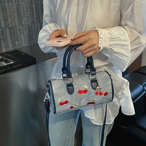 Grey denim boston bag with cute cherry embroidery, versatile women crossbody handbag.