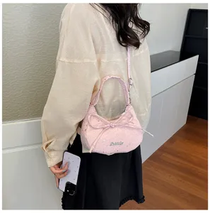 Pink star bow shoulder bag stylish dumpling handbag for women daily casual wear fashion accessories.