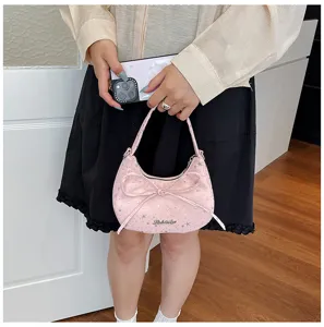 Pink star bow handbag detail, cute shoulder bag, unique niche design fashion small bag.