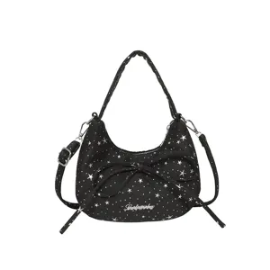Black starry hobo shoulder bag with bow and braided handle for women stylish daily use.