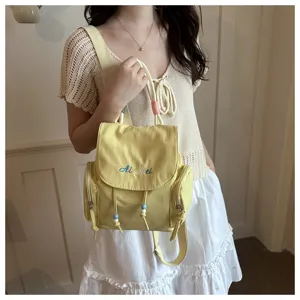 Mochila informal de lona para mujer con bordado y cordón de cuentas para viaje y uso diario.