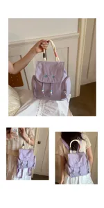 Vista detallada de la elegante mochila morada clara con asa de cuerda trenzada y cuentas.