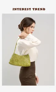 Elegant woven leather shoulder bag for women, chic underarm handbag with stylish intrecciato design.