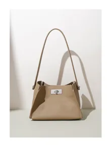 Elegant taupe leather shoulder bag for women, spacious commuter handbag with turn-lock.