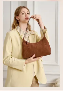 Stylish brown suede underarm shoulder bag for women, elegant casual commuting design.