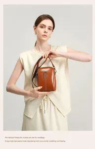 Stylish brown leather mini crossbody bag for women, perfect for phone and essentials.