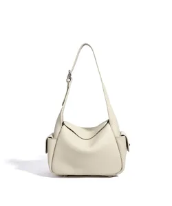 Sac à bandoulière en cuir véritable pour femme, design chic de type dumpling, sac élégant.