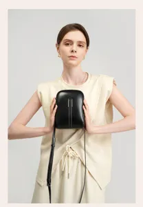 Black genuine leather phone crossbody bag, stylish mini messenger bag for women, versatile everyday.