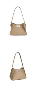 Detailed view of the beige leather bucket bag featuring a secure metal turn-lock.