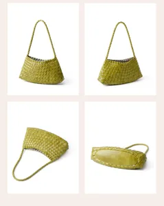 Detailed view of the green woven leather shoulder bag, highlighting the handcrafted texture.