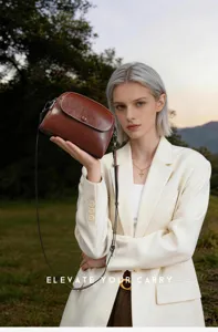 Genuine leather vintage crossbody bag for women, elegant brown shoulder handbag style.