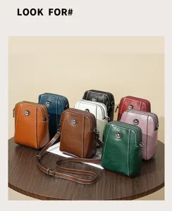 Detail view of waxed genuine leather mini crossbody bag with multiple color options.
