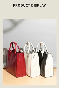 Detailed view of fashionable leather handbags showing fine texture, stitching and spacious interior.