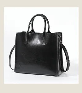 Women genuine leather tote bag, elegant black shoulder handbag for daily professional use.