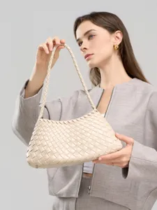 Beige woven leather shoulder bag, elegant underarm handbag for women daily commute.