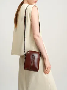 Brown genuine leather crossbody phone bag for women, stylish minimalist mini shoulder bag.