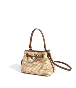 Straw woven handbag with leather top handle, stylish vacation crossbody bag for women spring summer.