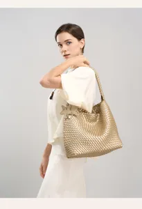 Gold woven hobo shoulder bag feature detail, stylish casual large capacity fashion tote.