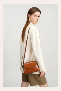 Chic retro genuine leather women crossbody bag, versatile small shoulder bag for daily fashion.