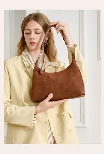 Stylish brown suede shoulder bag for women, elegant hobo handbag for daily commuting.