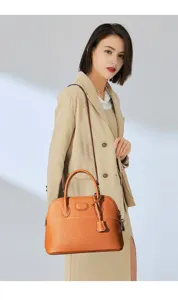 Classic leather dome shoulder bag for women, premium top-layer cowhide chic handbag.