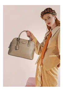 Detailed view of the premium genuine leather dome handbag, showing fine stitching and hardware.