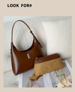 Close-up of premium brown leather hobo shoulder bag and canvas pouch in elegant lifestyle setting.