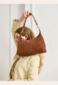 Women's brown suede shoulder bag, elegant vintage hobo crossbody bag for daily commute fashion.