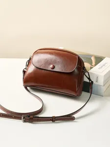 Vintage genuine leather brown crossbody bag for women, retro shoulder bag with flap.