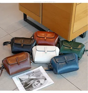 Multi-color leather crossbody shoulder bag scene, vintage oil wax cowhide design detail.