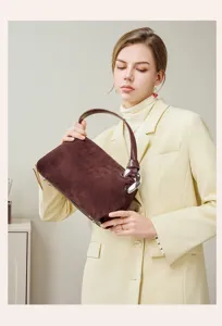 Elegant women's brown suede shoulder handbag with metal hardware for autumn and winter daily use.