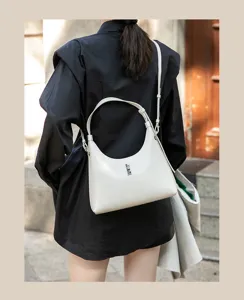 Minimalist white leather hobo shoulder bag for women, chic 2025 spring summer fashion accessory.
