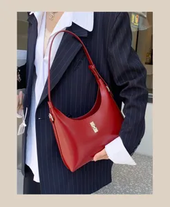 Stylish red leather hobo shoulder bag for women, chic crescent design for daily wear.