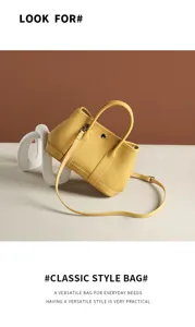 Elegante bolso cruzado de cuero amarillo con asa superior y diseño elegante para mujeres.
