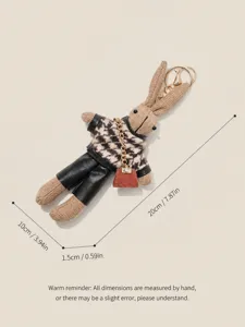 Porte-clés lapin en peluche mignon avec pull pied-de-poule et pantalon en cuir.