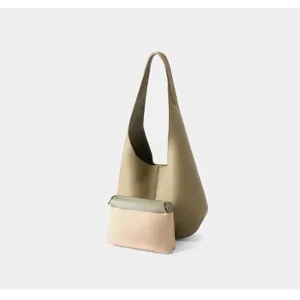 Premium cowhide underarm hobo bag with matching pouch, minimalist design for daily commute.