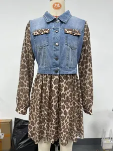 Detailed view of leopard print patchwork dress with denim vest bodice design