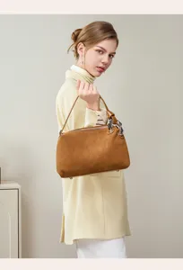 Elegant brown suede shoulder bag for women, chic metal ring daily autumn handbag.