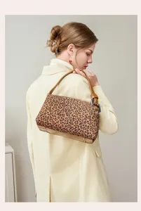 Detail view of stylish leopard print leather shoulder handbag with zipper for women autumn winter
