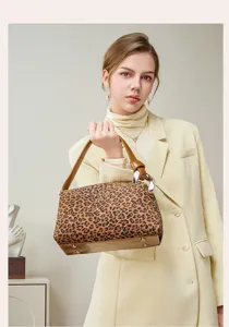 Leopard print leather handbag detail view, stylish autumn winter shoulder bag for women