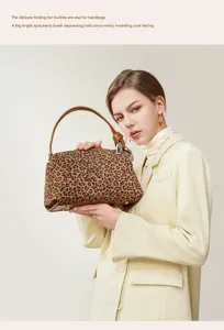 Leopard print leather handbag for women, stylish shoulder bag with metal folding fan buckle.