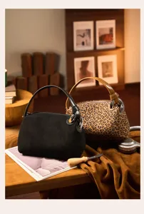 Stylish women zipper shoulder handbag, black and leopard print casual large capacity bag.