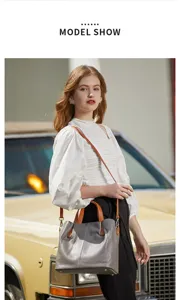 Detail shot of a stylish two-tone leather tote bag showcasing premium texture and spacious design.