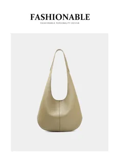 Minimalist cowhide underarm shoulder bag, elegant hobo tote for daily commute and fashion wear.